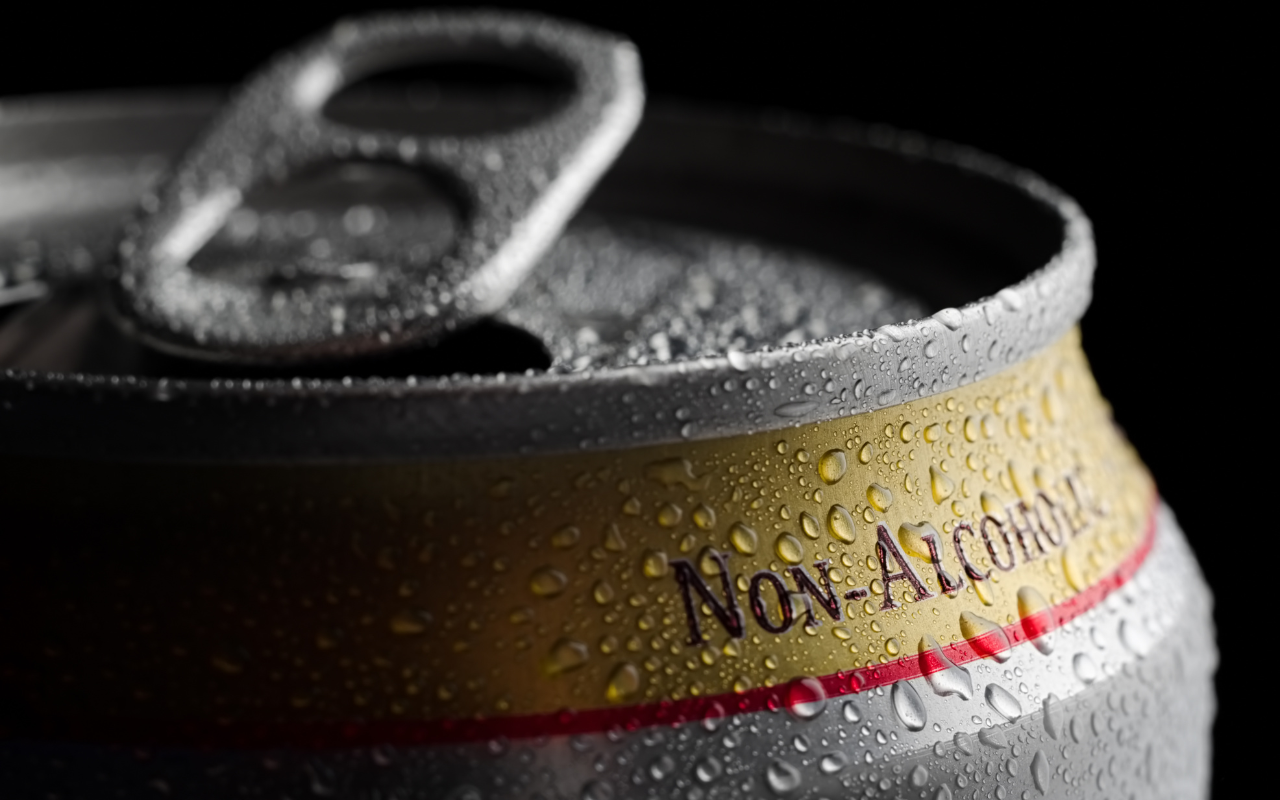 Macro image of non-alcoholic drink can, cold with condensation