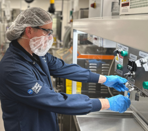 An employee working with a device.